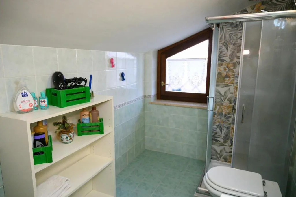 Camera Matrimoniale con Balcone — A Casa di Lu’ Elegant Rooms