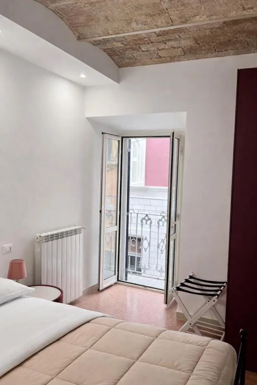 Camera Matrimoniale con Balcone — Boca Luxury Rooms