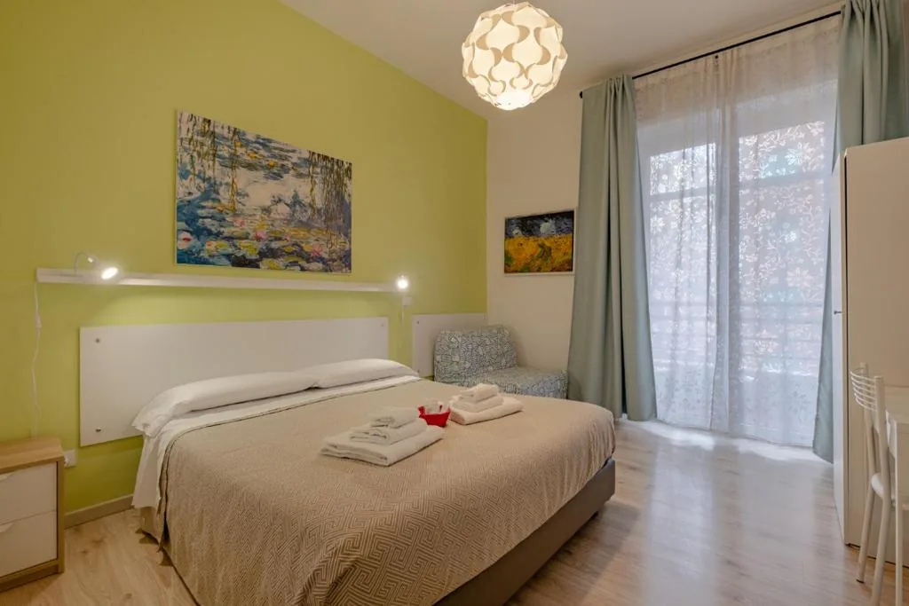 Camera Matrimoniale con Balcone — Damiani & Sister Guesthouse