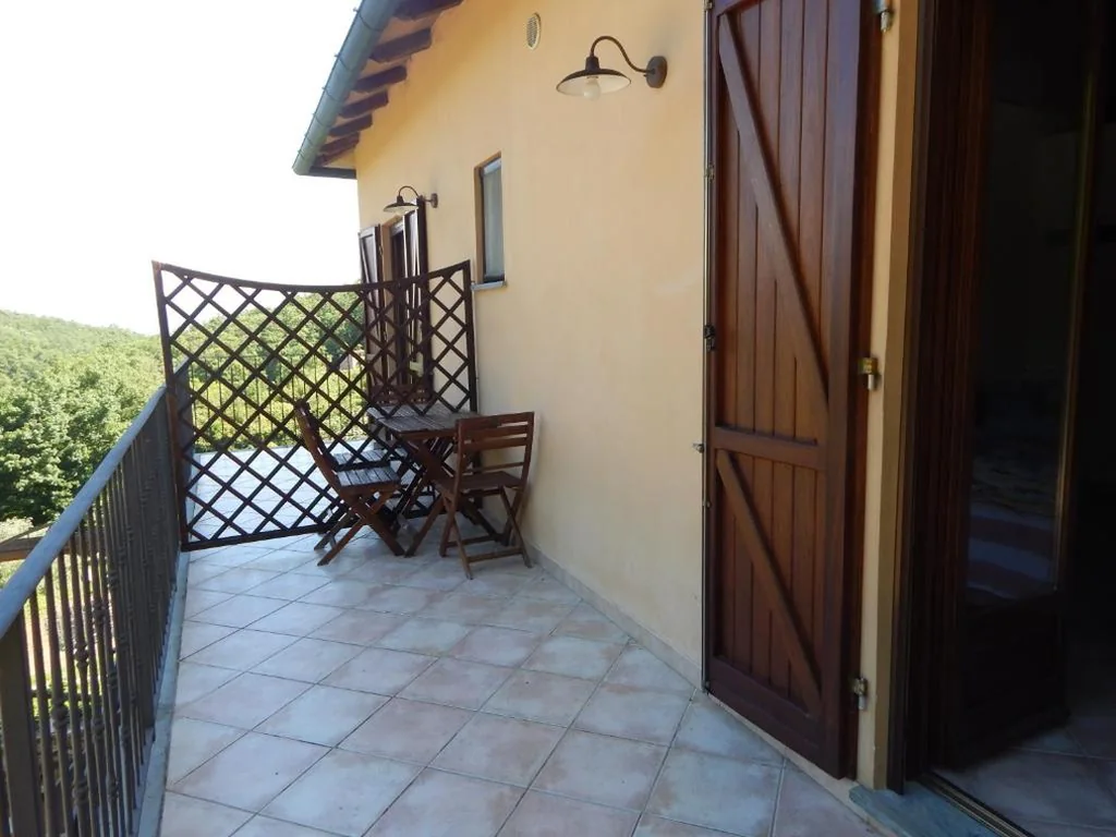 Double Room with Balcony — I Lecci