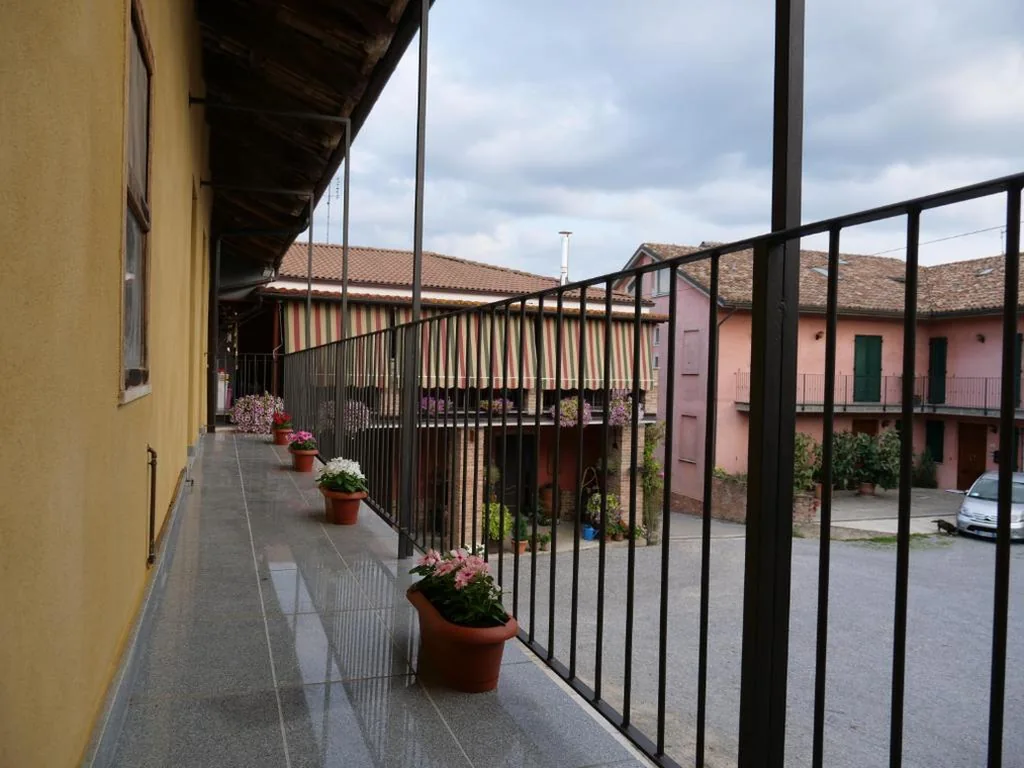 Camera Matrimoniale con Balcone — I Quattro Grappoli