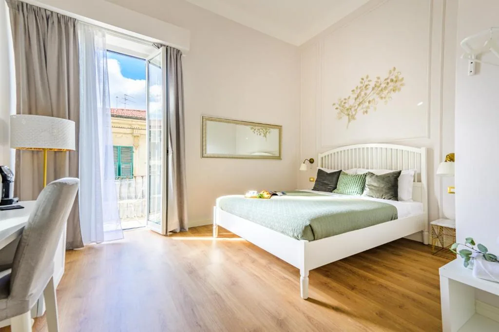 Double Room with Balcony — L’Opera Rooms & Suite