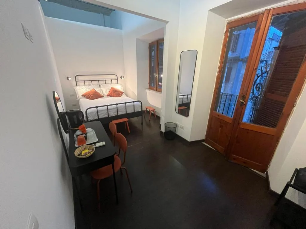 Double Room with Balcony — Roomes – 3×4 San Giovanni