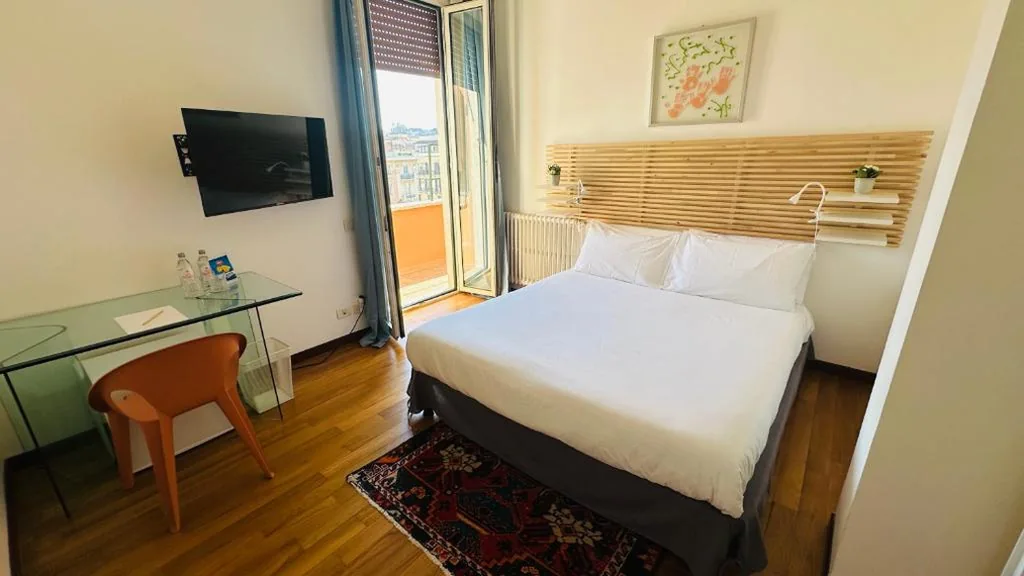 Double Room with Balcony — Terrazza Urania – Penthouse terrace with 360 view of Rome