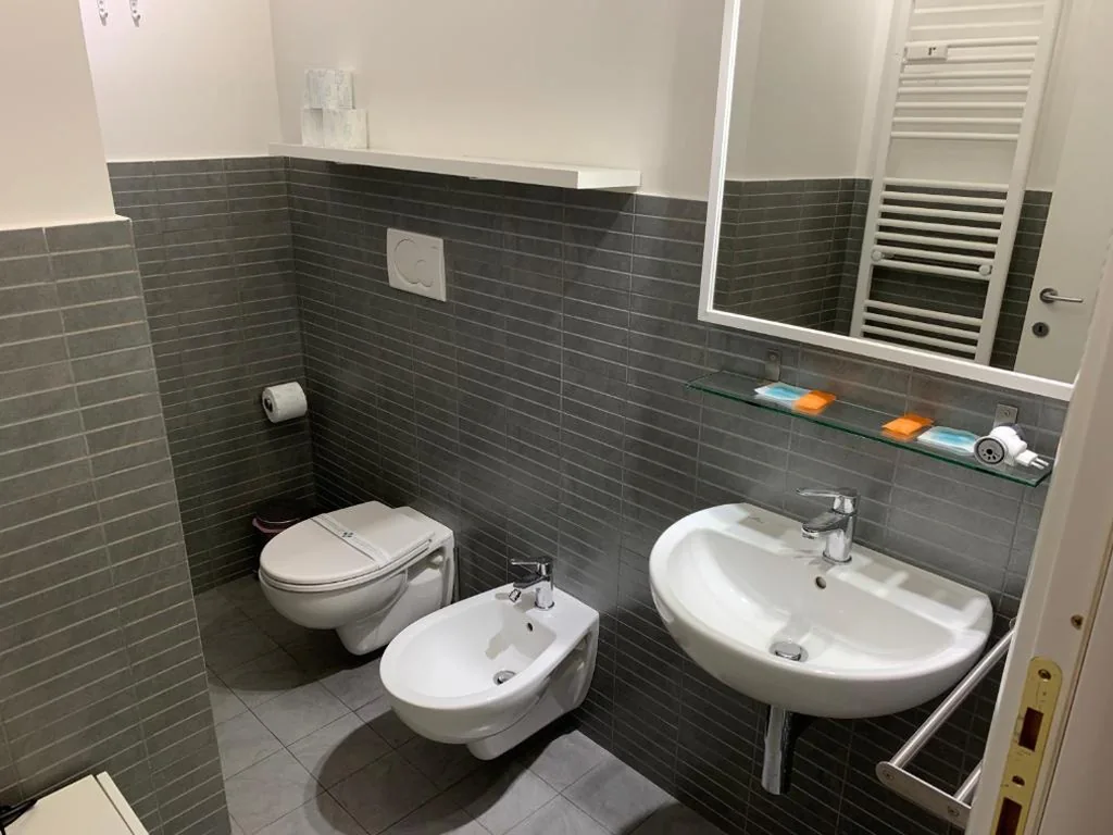 Double Room with Balcony — Tiburtina Suites, Roma