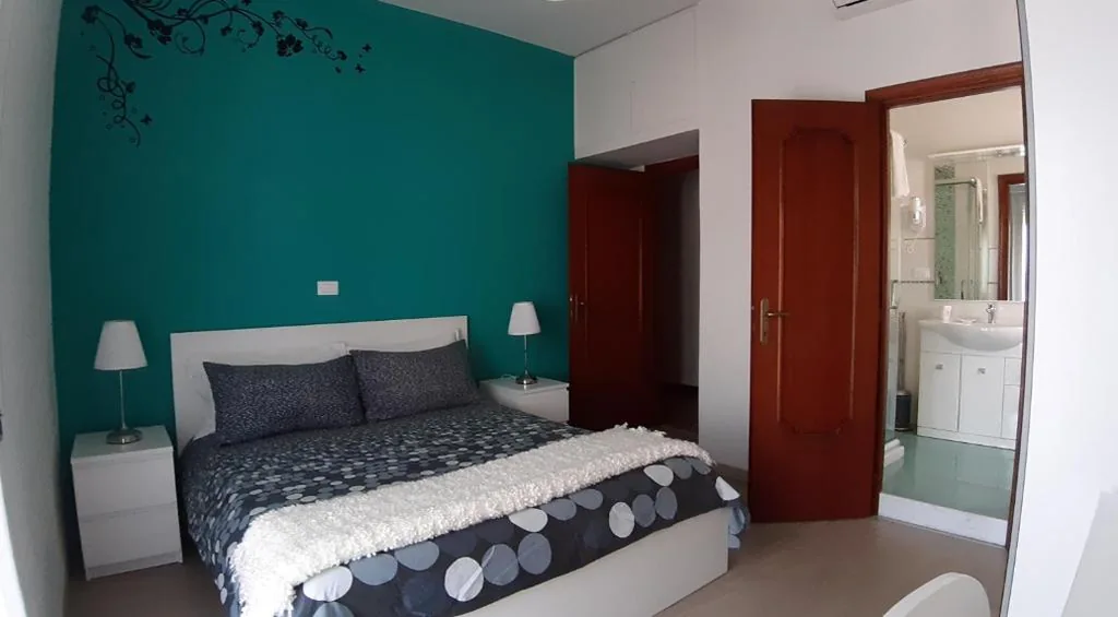 Double Room with Balcony — Una Stanza In Centro