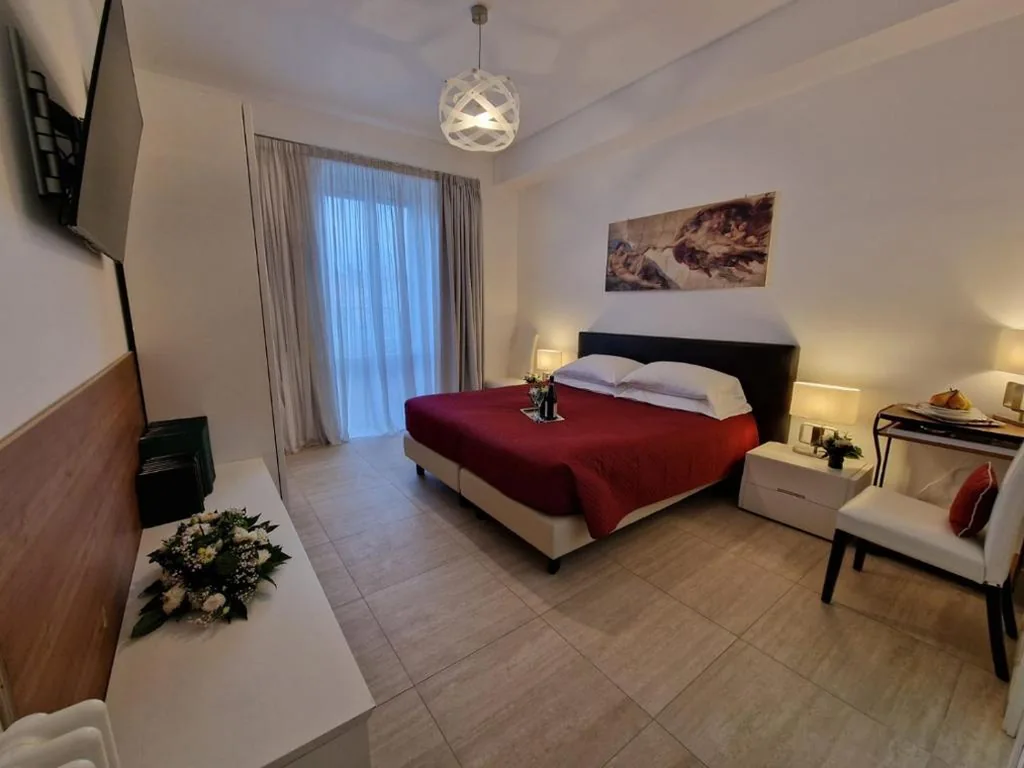 Camera Matrimoniale con Balcone — VATICAN GUEST HOUSE ROOMS in Rome