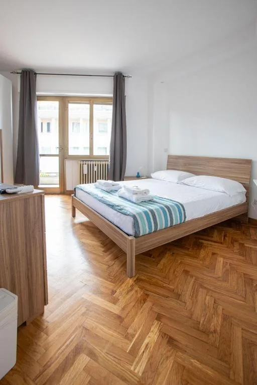Double Room with Balcony — VI Domus – Vatican Museum Guest House – Roma