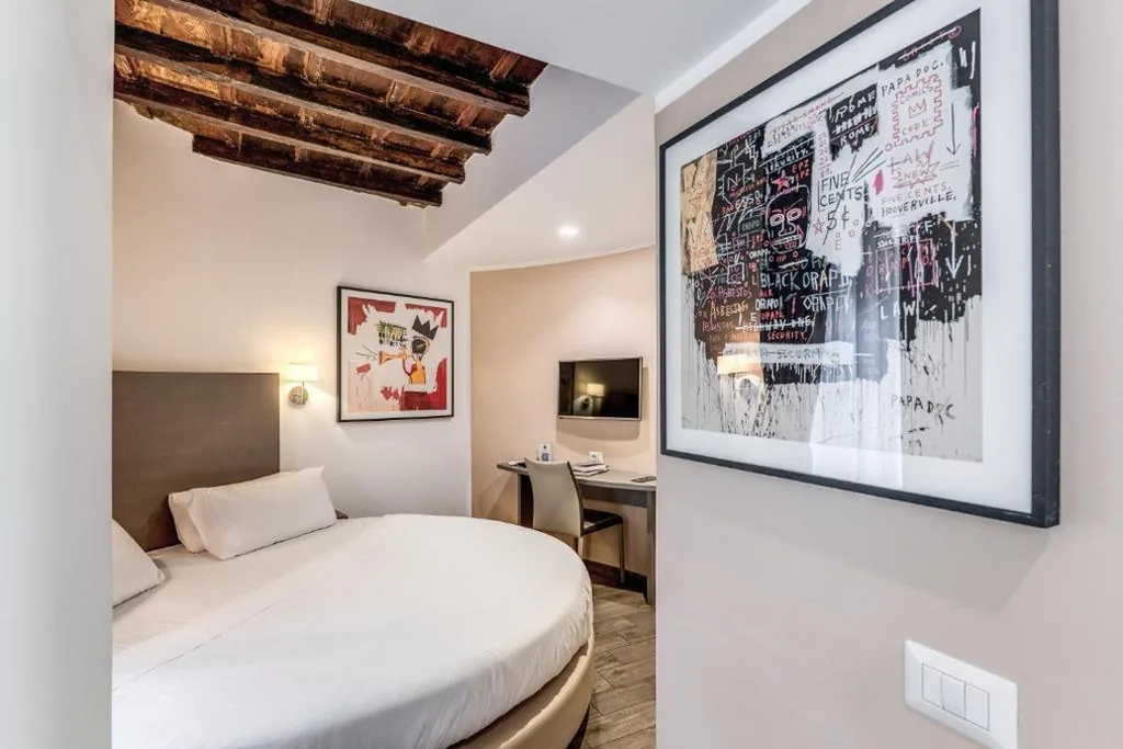 Camera Matrimoniale con Letto Rotondo — Reginella Suites