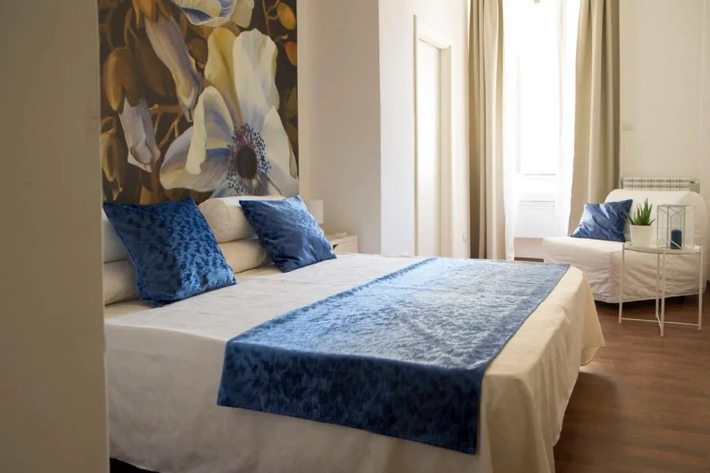 Camera Matrimoniale con Letto Supplementare — Domus Crescenzio – Guest House