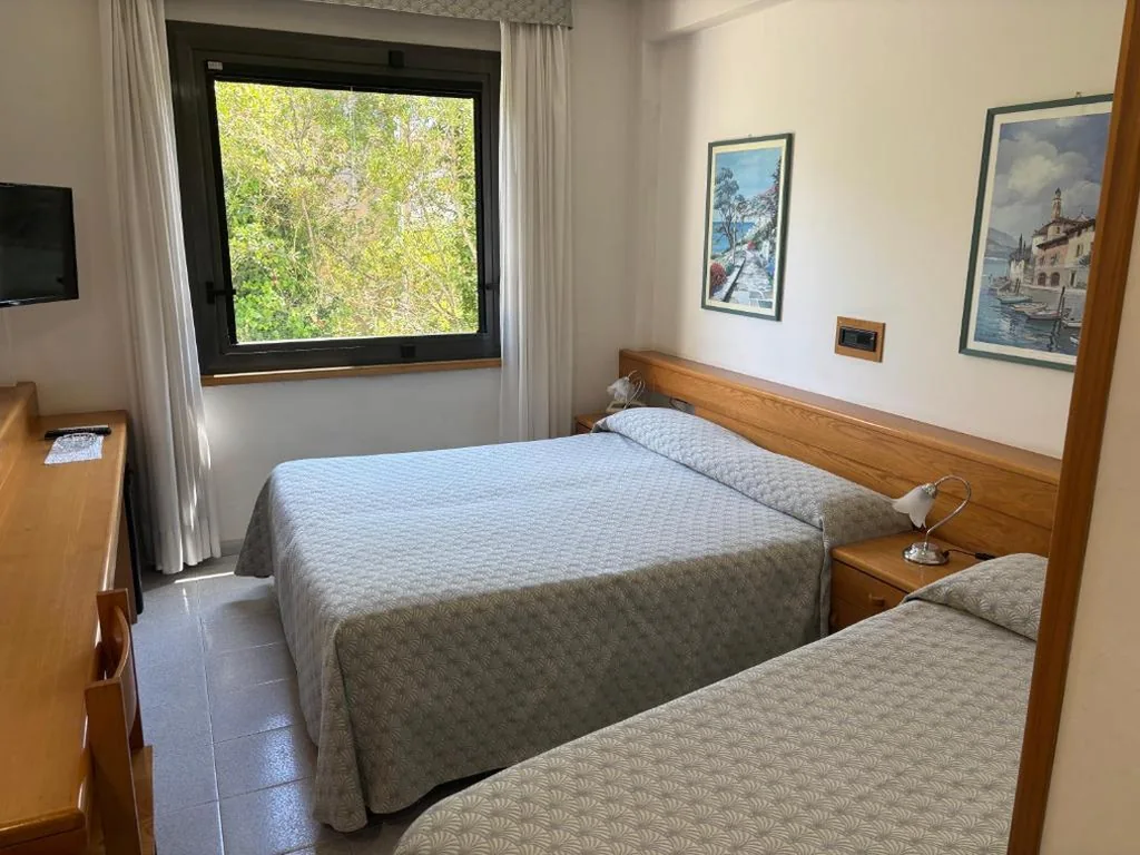 Camera Matrimoniale con Letto Supplementare — Hotel Le Palme