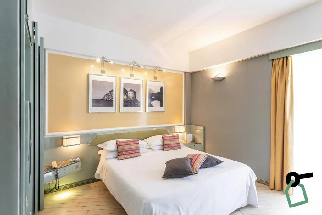 Camera Matrimoniale con Letto Supplementare — HOTIDAY Room Collection – Circeo