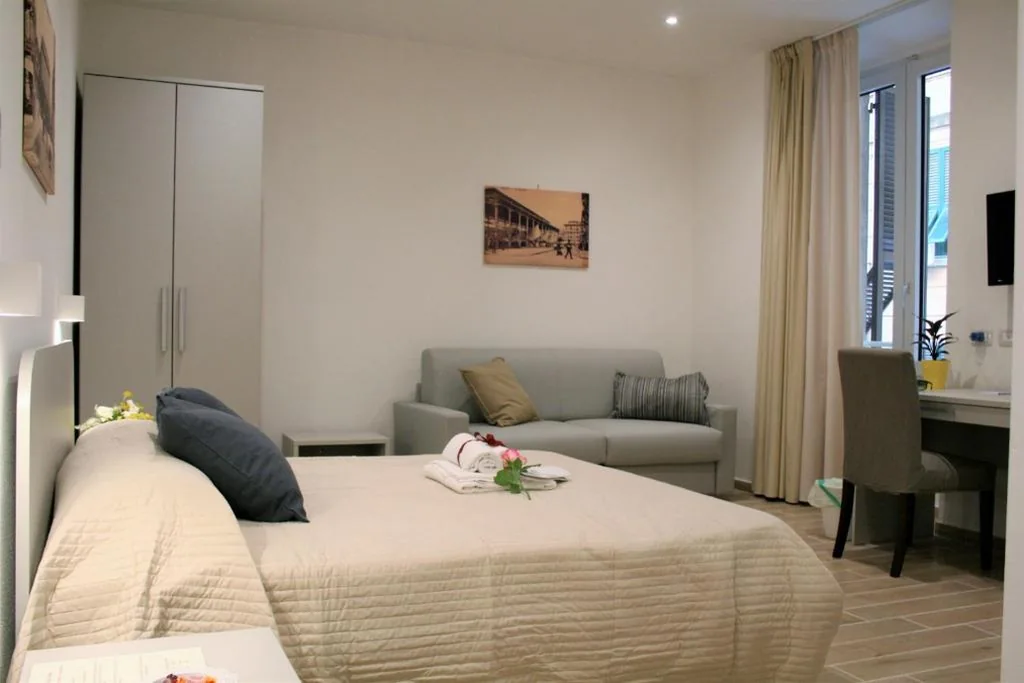 Camera Matrimoniale con Letto Supplementare — Real Rooms
