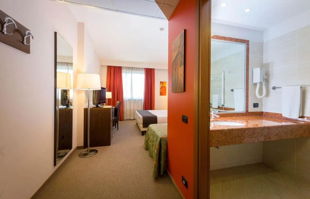 Camera Matrimoniale con Letto Supplementare — Torino Hotel San Luigi – Ristorante Trait d’Union