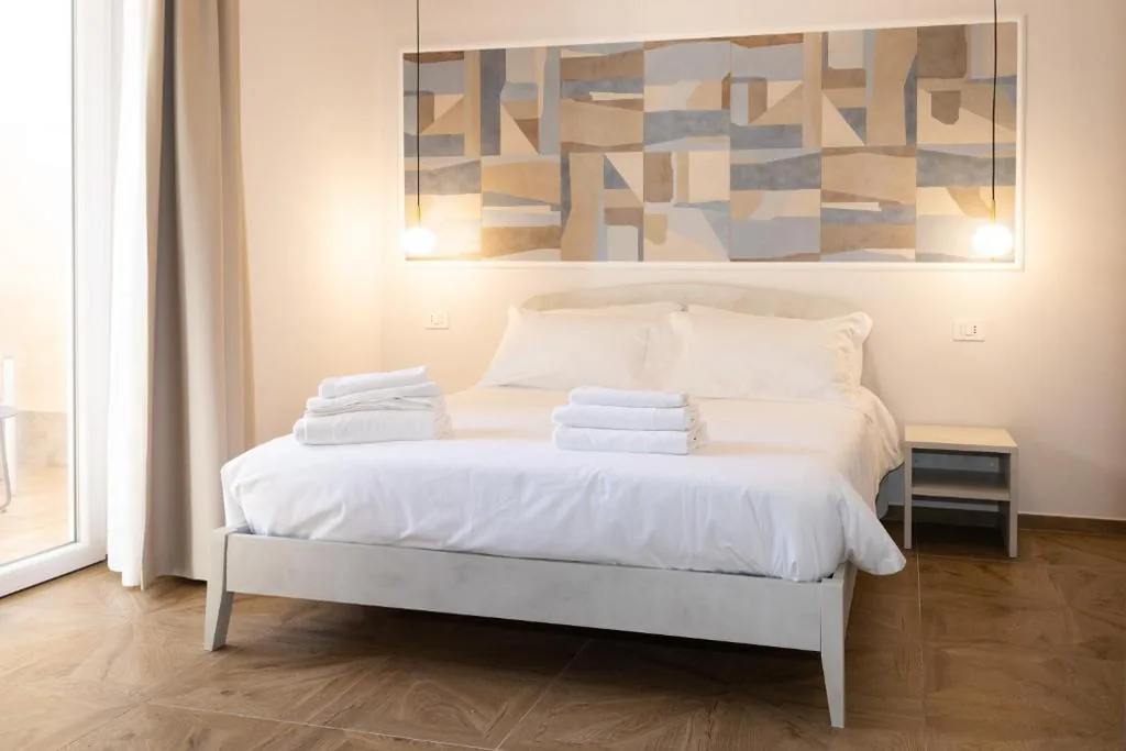 Double Room with Patio — Guest house – L’amante e il marinaio