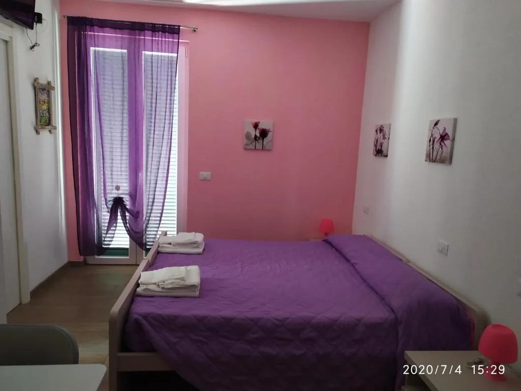 Camera Matrimoniale Deluxe (2 Adulti + 1 Bambino) — La vie est belle