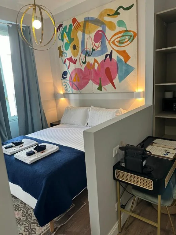 Deluxe Double Room (2 Adults + 1 Child) — Rome Plaza Suites, Luxury Collection