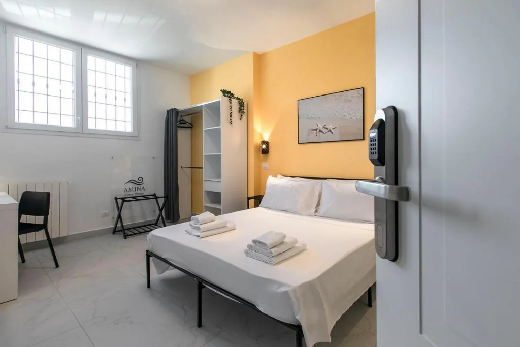 Camera Matrimoniale Deluxe — AMINA Guest House