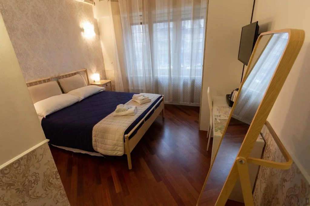 Camera Matrimoniale Deluxe — Aurelio Deluxe Rooms