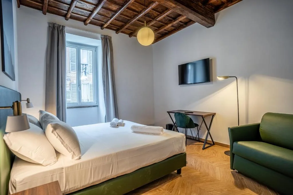 Camera Matrimoniale Deluxe con 1 Letto Supplementare — Fantini Rooms-Monti