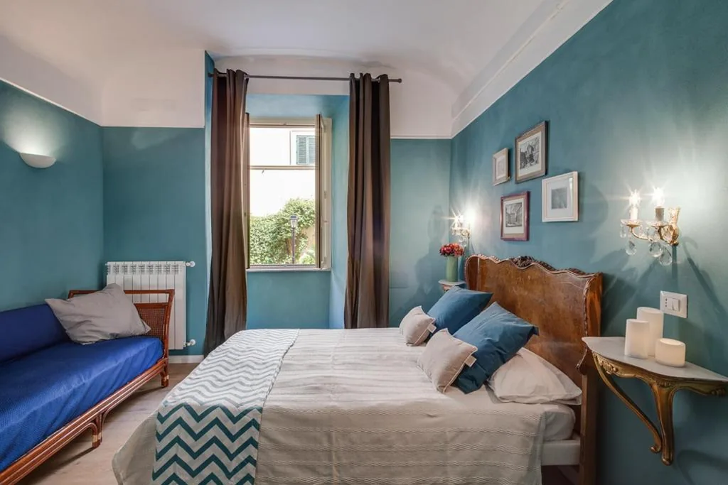 Camera Matrimoniale Deluxe con 1 Letto Supplementare — femasuites