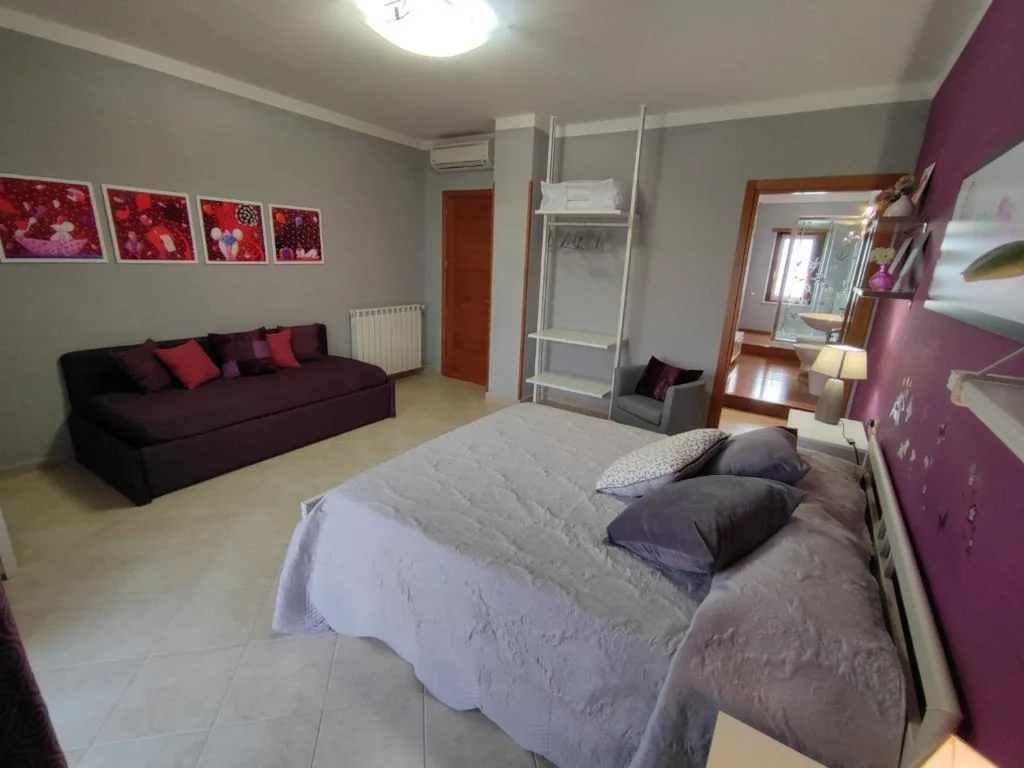 Deluxe Double Room with 1 Extra Bed — Il Giardino delle Zagare
