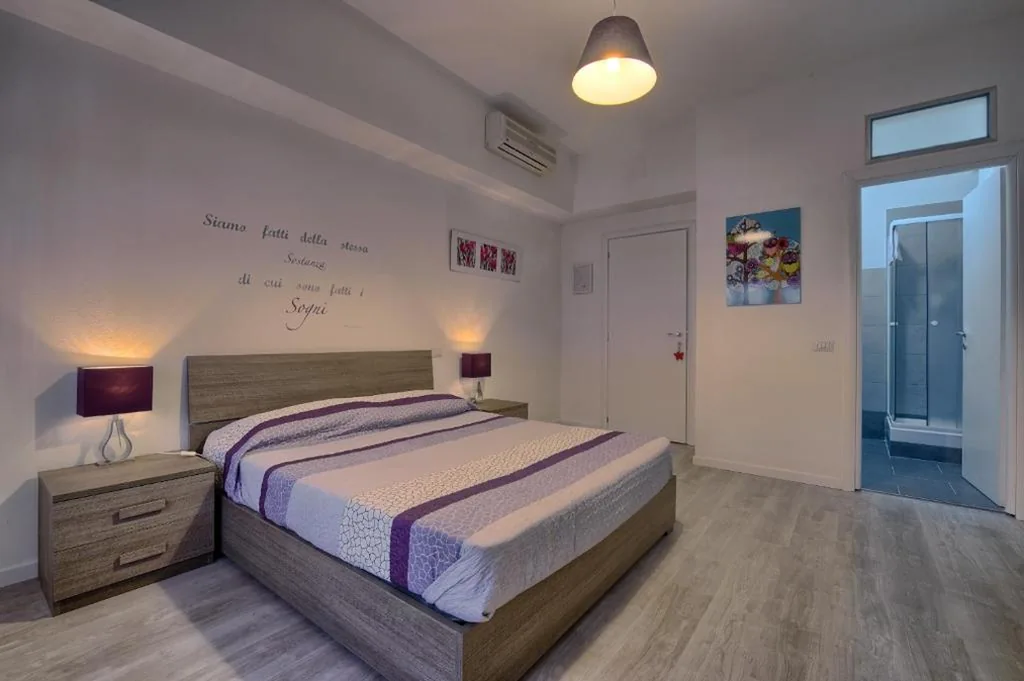 Camera Matrimoniale Deluxe con 1 Letto Supplementare — Madì B&B