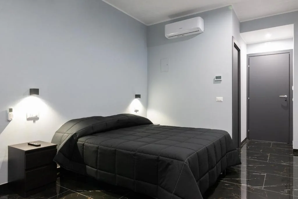 Camera Matrimoniale Deluxe con 1 Letto Supplementare — magami airport ciampino