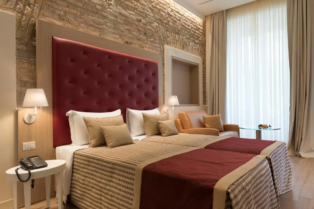 Deluxe Double Room with 1 Extra Bed — Navona Luxury Guesthouse