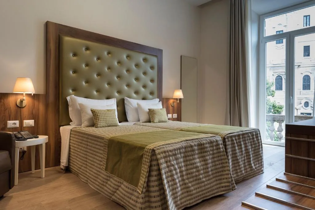 Deluxe Double Room with 1 Extra Bed — Navona Luxury Guesthouse