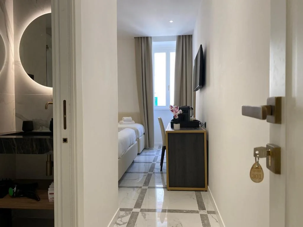 Camera Matrimoniale Deluxe con 1 Letto Supplementare — Suite Croce