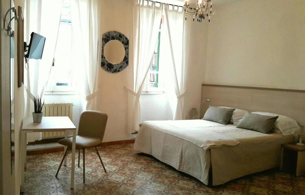 Deluxe Double Room with 1 Extra Bed — Taverna del Capitano Rooms