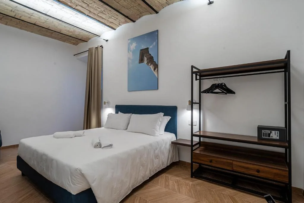 Deluxe Double Room with 1 Extra Bed — Urban Vatican Rooms