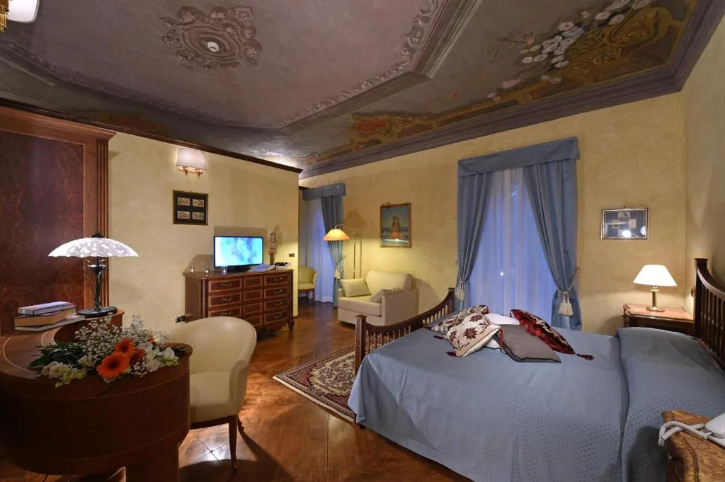 Camera Matrimoniale Deluxe con 1 Letto Supplementare — Villa Durando
