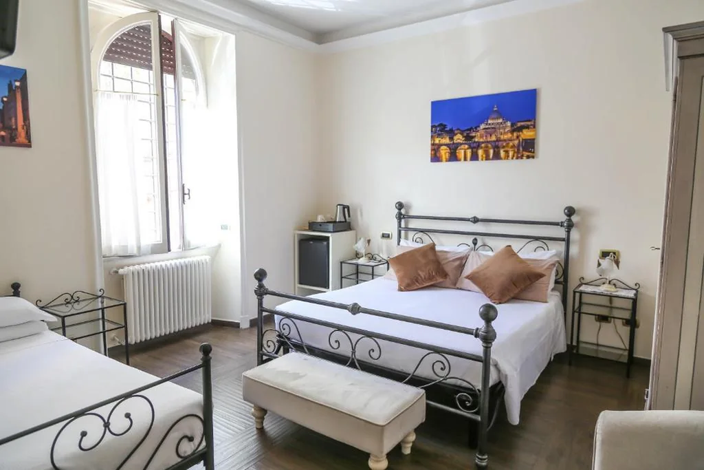 Camera Matrimoniale Deluxe con 1 Letto Supplementare — Villa Matissa