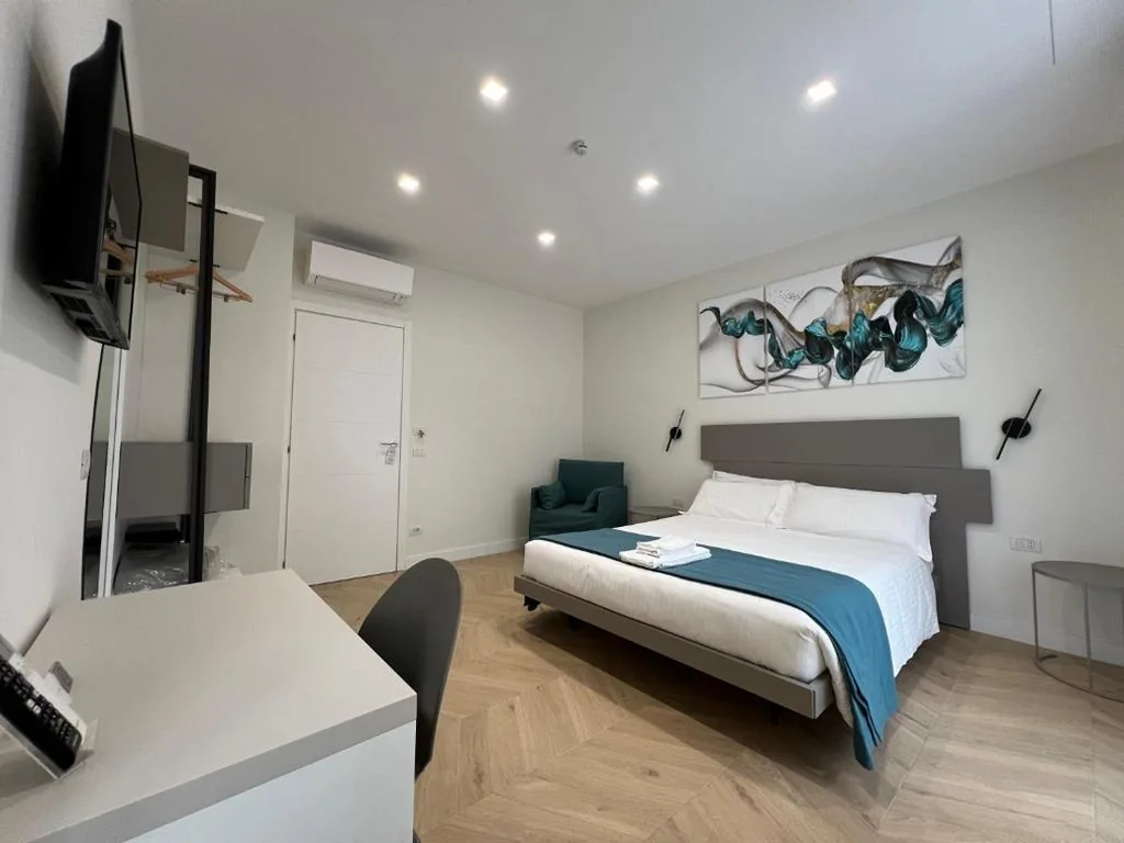 Deluxe Double Room with 1 Extra Bed — Vittoria’s Luxury Rooms