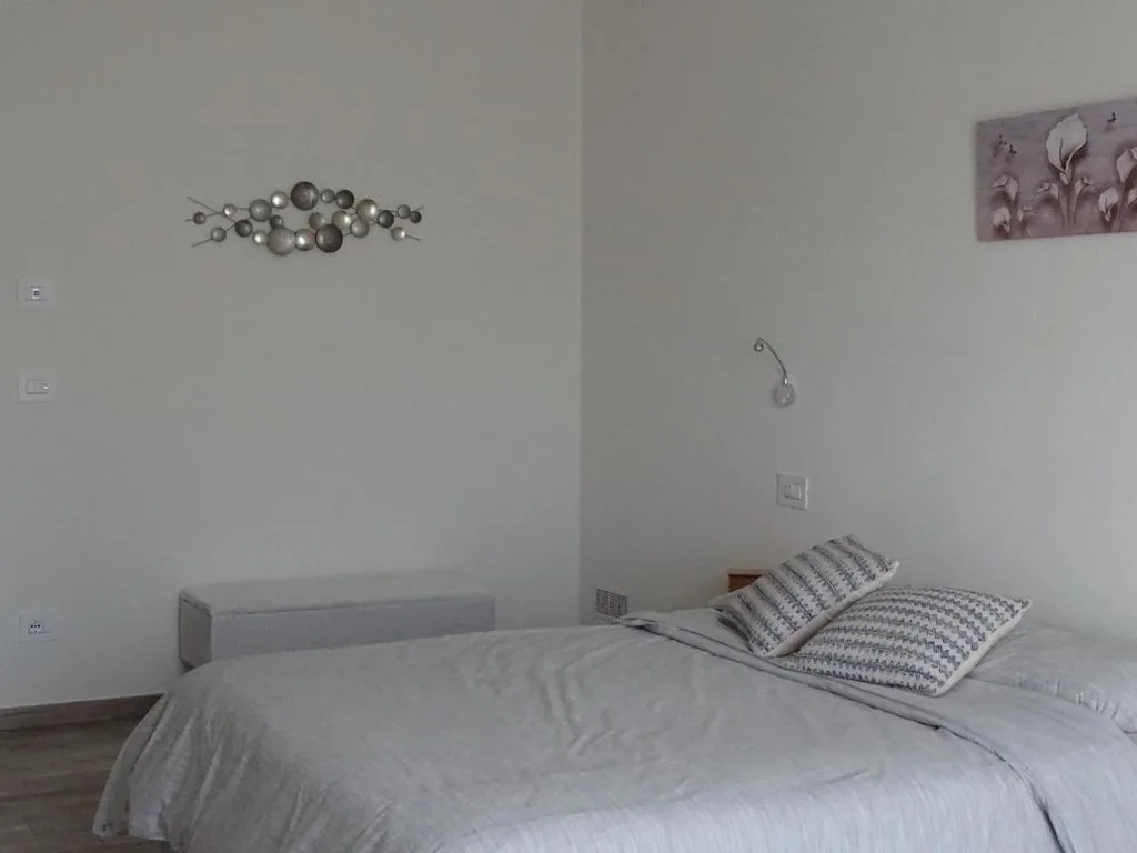 Camera Matrimoniale Deluxe con Balcone — Al Tirabusòn Country House