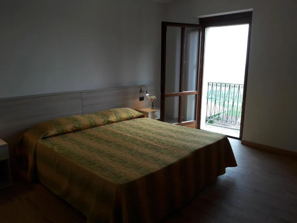 Deluxe Double Room with Balcony — Albergo Diffuso Belvedere