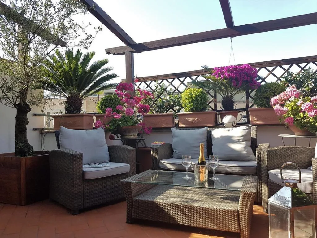 Deluxe Double Room with Balcony — Althea Inn Roof Terrace