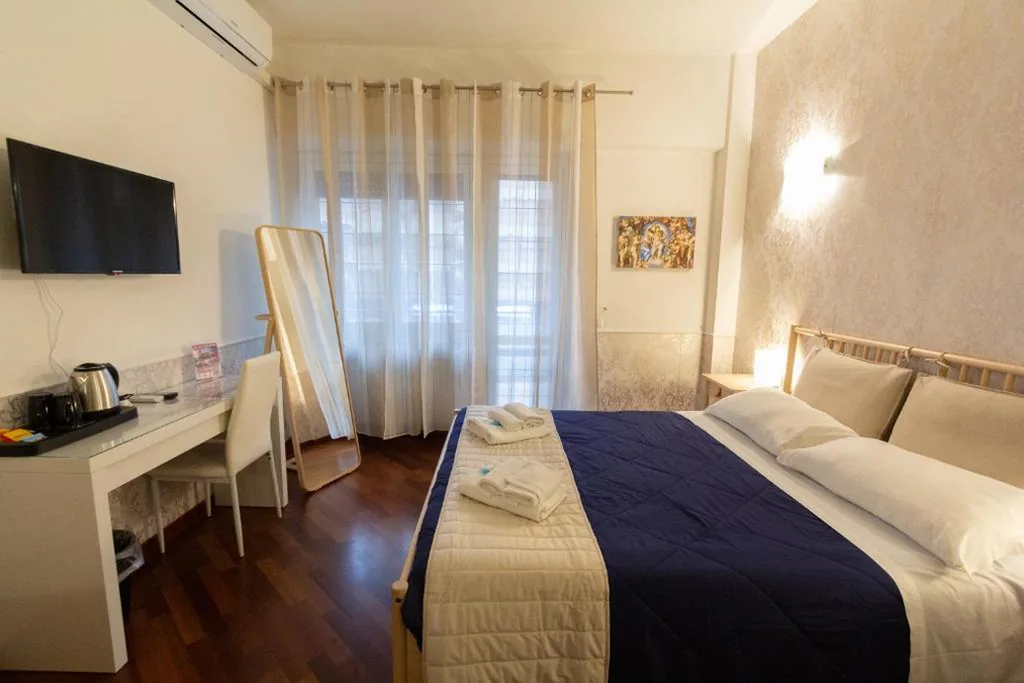 Camera Matrimoniale Deluxe con Balcone — Aurelio Deluxe Rooms