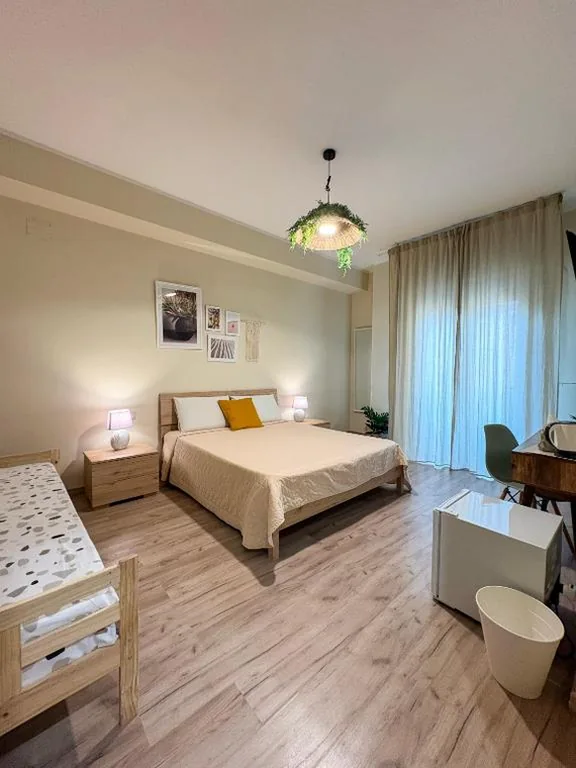 Deluxe Double Room with Balcony — Favola Guesthouse Affittacamere