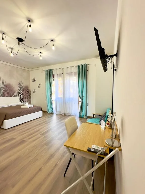 Camera Matrimoniale Deluxe con Balcone — iLbacioDelSole