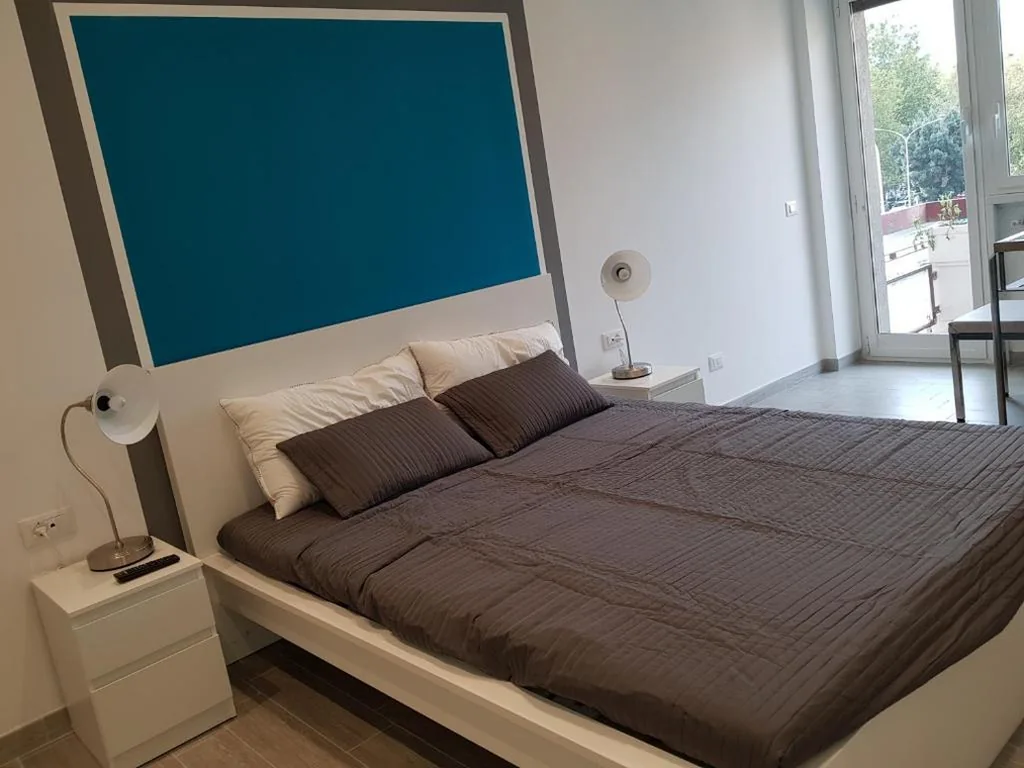 Deluxe Double Room with Balcony — In Rome Trastevere Rooms