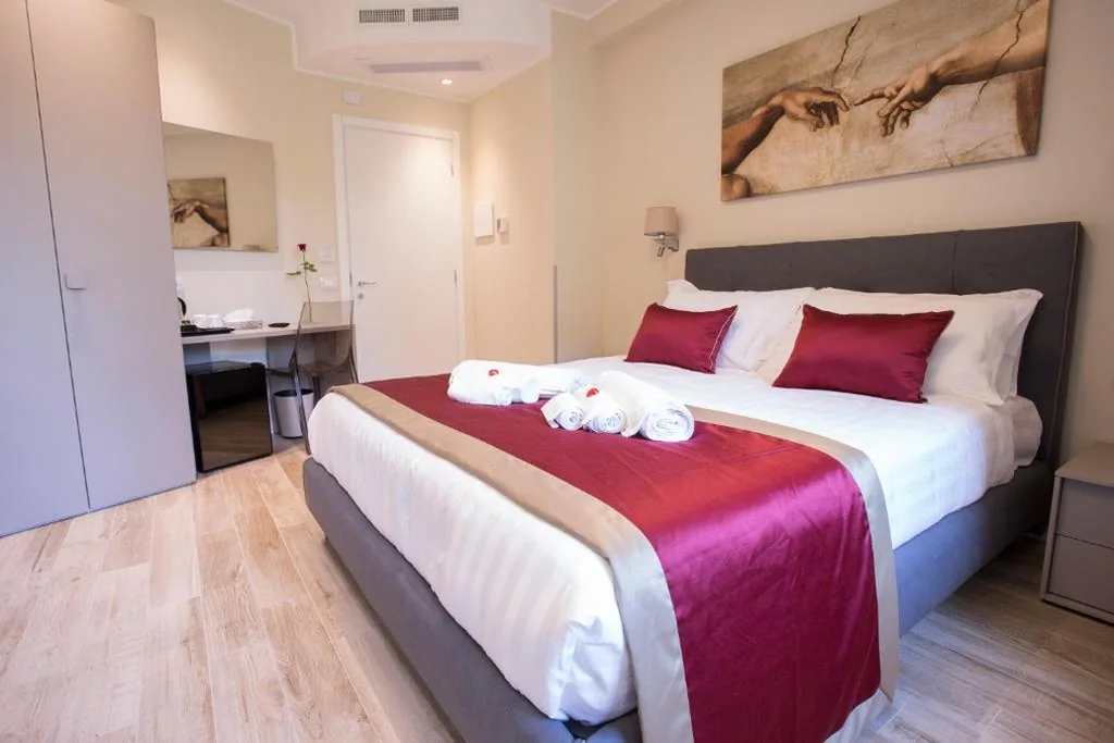 Camera Matrimoniale Deluxe con Balcone — Leonardo Da Vinci Guest House