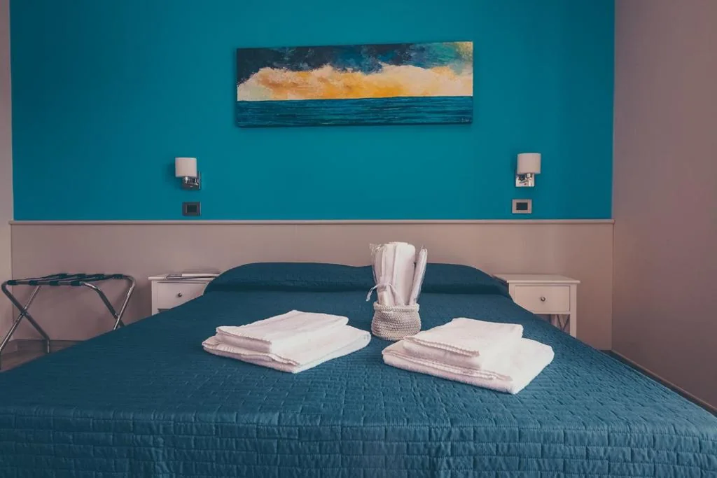 Deluxe Double Room with Balcony — Oltre il Mare Guest House