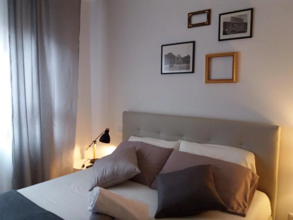 Camera Matrimoniale Deluxe con Balcone — St. Peter’s Luxury Rooms