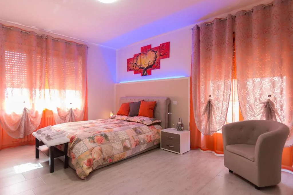 Camera Matrimoniale Deluxe con Balcone — SuiteIRIS B&B