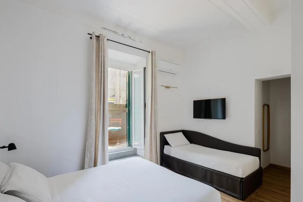 Deluxe Double Room with Balcony — Suites by Chloe
