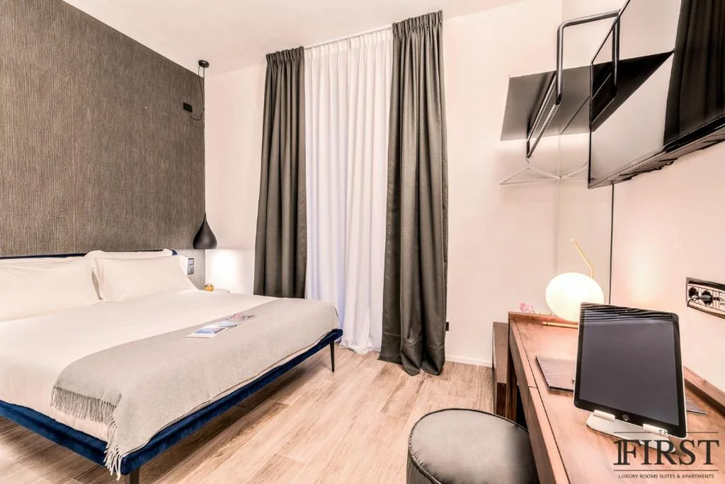 Deluxe Double Room with City View and Balcony — La Spezia by The First – Luxury Rooms & Suites