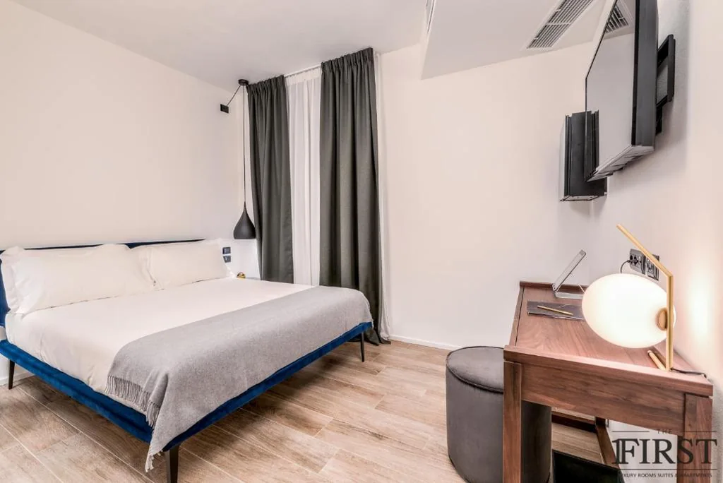 Deluxe Double Room with Courtyard View — La Spezia by The First – Luxury Rooms & Suites
